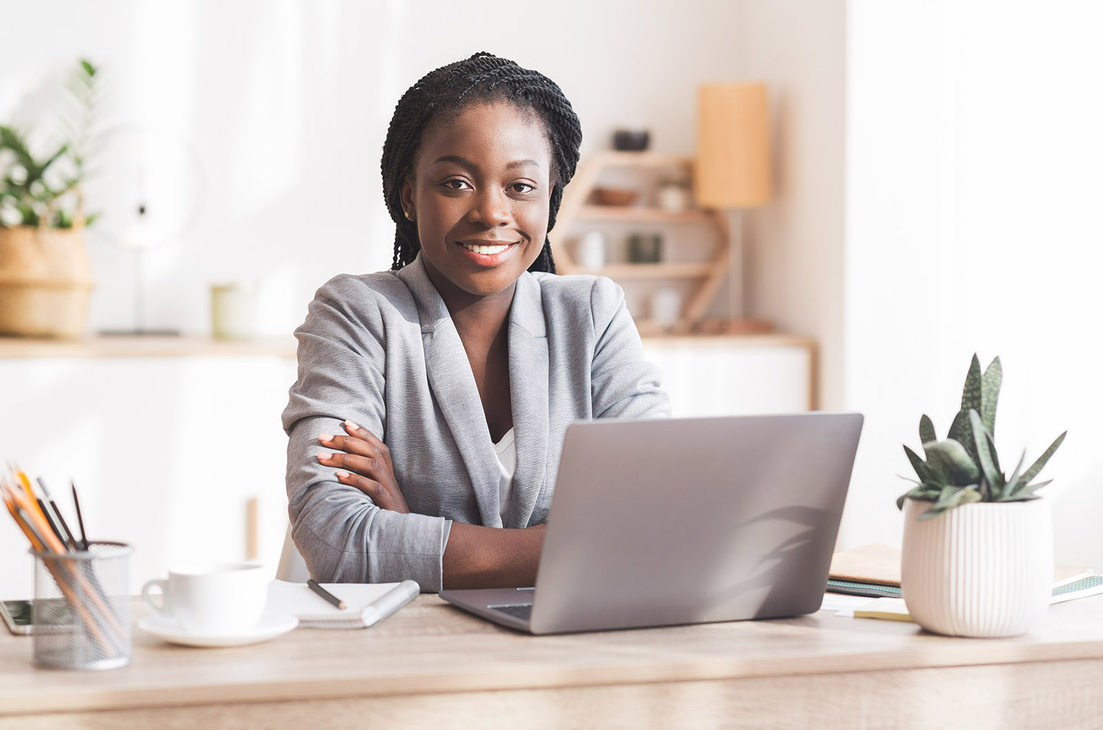 Client and sales manager handshaking after closing profitable deal in company office, recruitment concept. Attractive Hispanic position candidate and HR manager shaking hands after successful hiring